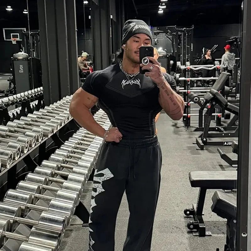 2025 YOUNGAL New Men's Fitness T-shirts clothing  sports Tshirt tights high elastic training short sleeve fitness man clothing