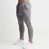 2022 Fashion Men Gyms Pure color Pants Joggers Fitness Casual Long Pants Men Workout Skinny Sweatpants Jogger Tracksuit Trousers