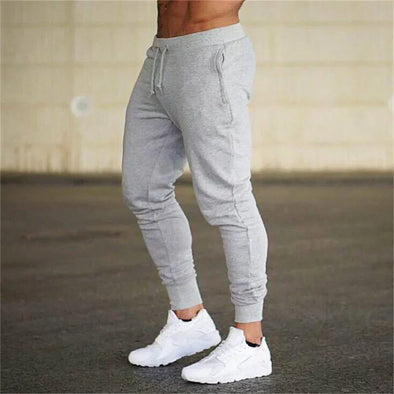 2022 Fashion Men Gyms Pure color Pants Joggers Fitness Casual Long Pants Men Workout Skinny Sweatpants Jogger Tracksuit Trousers